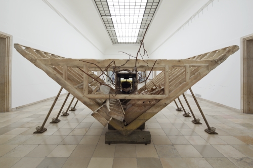 Matthew Barney. Boat of Ra, 2014. Wood, cast bronze, resin-bonded sand, steel, and gold plating, 132 × 600 × 288 in. Installation view, courtesy Laurenz Foundation, Schaulager, Basel. Photograph: Maximilian Geuter.