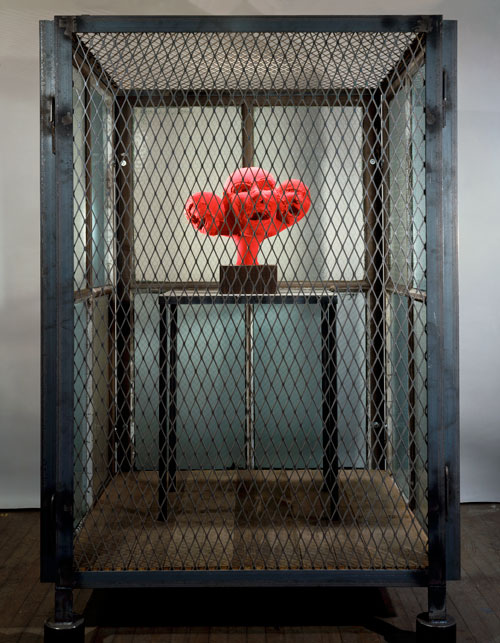 Louise Bourgeois. Cell XIV (portrait), 2000. Steel, glass, wood, metal and red fabric, 188 x 121.9 x 121.9 cm. Photograph: Christopher Burke, © The Easton Foundation/Licensed by DACS.