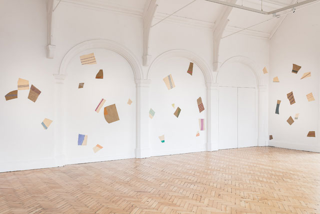 Giorgio Griffa. Frammenti, 1980. 60 fragments of acrylic on canvas. Installation view, gallery 3. Photograph: Mark Blower.