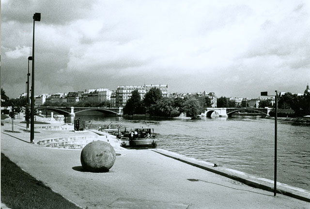 Black Sphere, cement on steel armature, Les Bords de Seine, Paris. Photograph: Andrea Sarti.
