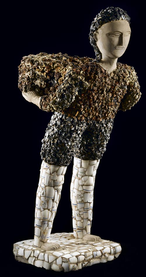 Nek Chand (b. 1924). <em>Boy fetching Flower Pot</em>, c. 1984. Concrete over metal armature with mixed media 47 x 24 x 20 in. Collection American Folk Art Museum, New York. Gift of The National Children's Museum in honor of Gerard C. Wertkin 2004.25.22. Photo by Gavin Ashworth