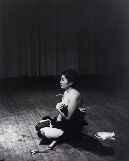 Yoko Ono. Cut Piece, 1964. Performed by the artist, 21 March 1965. Carnegie Recital Hall, New York City. Film still from Maysles Brothers. © Yoko Ono.
